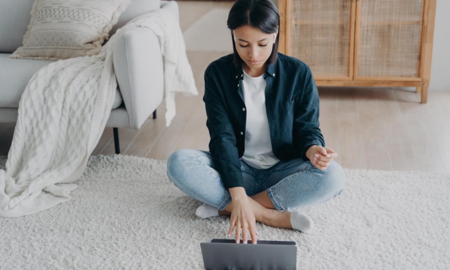 Person organizing receipts and financial documents on desk